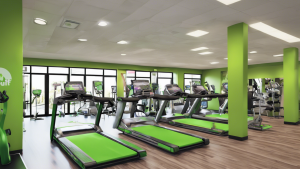 YouFit gym interior with modern equipment and group fitness classes